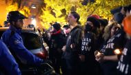 Members of US Capitol Police and protesters stand off outside the headquarters of the Democratic National Committee on November 15, 2023 on Capitol Hill in Washington, DC. Alex Wong/Getty Images/AFP 