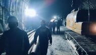 Photo taken on November 13, 2023, and released by the State Disaster Response Force (SDRF) shows rescue workers at the site after a tunnel collapsed in the Uttarkashi district of India's Uttarakhand state. (Photo by State Disaster Response Force (SDRF) / AFP)


