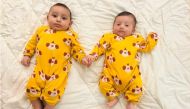 Baby Iyas (left) and baby Ezz [Maram Humaid/Al Jazeera]
