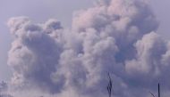Smoke billowing during Israeli bombardment on the Palestinian enclave on November 18, 2023. (Photo by Kenzo Tribouillard / AFP)