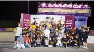 Qatar Racing Club Director Sheikh Jabor bin Khalid Al Thani poses for a photograph with the podium winners.