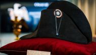 (FILES) A black bicorne hat with red, white and blue cockade worn by the French Emperor Napoleon I (1769-1821), from the Collection of Jean Louis Noisiez, is displayed before an auction sale at Osenat auction house in Paris on November 6, 2023. (Photo by Dimitar DILKOFF / AFP)
