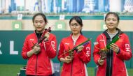 Women's 10m Air Pistol champion China's Xue Li (centre), silver winner Nan Zhao and third placed Ranxin Jiang. 