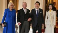 Britain's King Charles III and Britain's Queen Camilla pose with South Korea's President Yoon Suk Yeol and South Korea's First lady Kim Keon Hee during a formal farewell at Buckingham Palace, in central London on November 23, 2023. (Photo by Ben Stansall / POOL / AFP)