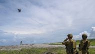 An Australian F-35A lightning fighter jets fly past during a joint exercise between Australian and Philippine troops at a naval base in San Antonio town, Zambales province on August 25, 2023. Photo by Ted ALJIBE / AFP