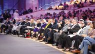 Minister of Education and Higher Education H E Buthaina bint Ali Al Jabr Al Nuaimi (fifth right) and Vice Chairperson and CEO of Qatar Foundation H E Sheikha Hind bint Hamad Al Thani (sixth right)with other officials and dignitaries during the closing session of WISE 11 yesterday.  