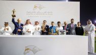 The connections of Kovanof celebrate with their trophies after the Thoroughbred Derby Trial win at Al Rayyan Racecourse yesterday. PICTURES: Juhaim/QREC  