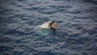 This handout photo taken on November 29, 2023 by Japan's 10th Regional Coast Guard Headquarters and received via Jiji Press shows the remains of a US Osprey aircraft that crashed at sea off the island of Yakushima. Photo by Handout / various sources / AFP