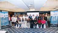 Qatar Gymnastics Federation President Ali Ahmed Al Hitmi and Secretary General, Ms Abeer Al Buanain along with officials and participants pose for a photograph at the inauguration of the FIG Academy for Artistic Gymnastics Level III coaching course in Doha.