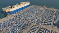 Cars wait to be loaded onto a ship for export at the port in Yantai, in China's eastern Shandong province on December 7, 2023. Photo by AFP