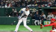 Ohtani Shohei (L) of Japan competes during the pool B match between China and Japan of 2023 World Baseball Classic at Tokyo Dome in Tokyo, Japan, March 9, 2023. (Xinhua/Zhang Xiaoyu)
