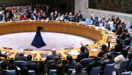 Ambassadors vote during a meeting about the situation in the Middle East, including the Palestinian question, at UN headquarters in New York on December 22, 2023. (Photo by Charly Triballeau / AFP)