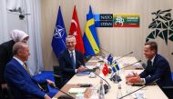File photo: NATO Secretary-General Jens Stoltenberg (top center), Turkish President Tayyip Erdogan and Swedish Prime Minister Ulf Kristersson (right) during a meeting, on the eve of a NATO summit, in Vilnius on July 10, 2023. (Photo by Yves Herman / AFP)

