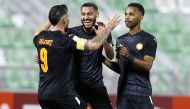 Umm Salal’s Andy Delort (left) celebrates with teammates after scoring a goal against Al Shamal yesterday. 