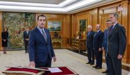 Newly appointed Spain's Economy Minister Carlos Cuerpo swears on the constitution in front of Spain's King Felipe VI during a ceremony at la Zarzuela Palace in Madrid, on December 29, 2023. (Photo by Andres Ballesteros / POOL / AFP)