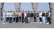 Players pose for a photograph with the WTT Finals Men trophy at Museum of Islamic Art, yesterday. 