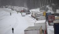A large number of trucks are stuck on the E22 highway at Linderِd in southern Sweden on January 4, 2024. (Photo by Johan Nilsson/TT / TT News Agency / AFP) 