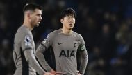 Tottenham Hotspur's South Korean striker #07 Son Heung-Min (R) reacts at the end of the English Premier League football match between Brighton and Hove Albion and Tottenham Hotspur at the American Express Community Stadium in Brighton, southern England on December 28, 2023. Photo by Glyn KIRK / AFP