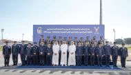 Minister of Interior, Commander of the Internal Security Force and Chairman of the Supreme Council of the Police Academy H E Sheikh Khalifa bin Hamad bin Khalifa Al Thani with the graduates.  