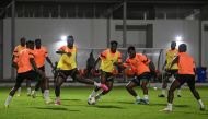 Ivory Coast's National Football team players take part during a training session at the technical's highschool stadium of Abidjan, on January 12, 2024, on the eve of the 2024 Africa Cup of Nations (CAN) football match between Ivory Coast and Guinea Bissau. (Photo by Issouf SANOGO / AFP)