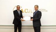 Officer-in-Charge of IACA Jaroslaw Pietrusiewicz (right) with Qatar's Permanent Representative to IACA H E Jassim Yaqoub Al Hammadi during the event. 
