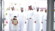 Assistant Undersecretary for Social Development Affairs at the Ministry of Social Development and Family, Fahd Mohammed Al Khayarin (centre), Director of the General Endowment Department at the Ministry of Awqaf and Islamic Affairs Dr. Sheikh Khalid bin Mohammed Al Thani (second left) with other officials at the event.
