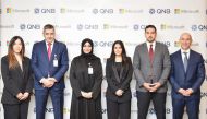 QNB and Microsoft officials pose for a group photo.