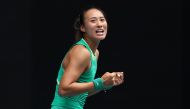 China's Zheng Qinwen celebrates victory against her compatriot Wang Yafan during their women's singles match on day seven of the Australian Open tennis tournament in Melbourne on January 20, 2024. (Photo by Martin Keep / AFP) 
