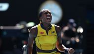 USA's Coco Gauff celebrates the match point against Ukraine's Marta Kostyuk during their women's singles quarter-final match in Melbourne on January 23, 2024. (Photo by Martin Keep / AFP)