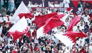 Qatar's Hassan Al-Haydos celebrates scoring his team's first goal during the AFC Asian Cup Qatar 2023 football match between Qatar and Palestine at Al Bayt Stadium in Al Khor, north of Doha, on January 29, 2024. (Photo by Giuseppe Cacace / AFP)