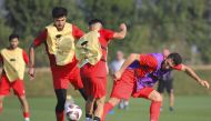 Tajikistan's players in action.