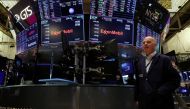 File photo: Screens display the trading information for ExxonMobil on the floor of the New York Stock Exchange (NYSE) in New York City, US, on December 9, 2022. REUTERS/Brendan McDermid

