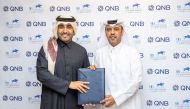 QREC Chairman Issa bin Mohammed Al Mohannadi (left) and QNB Group CEO Abdullah Mubarak Al Khalifa during the agreement signing ceremony.
