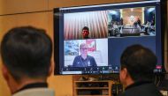 South Korean national team head coach Jurgen Klinsmann (on screen) attends via a video conference during a meeting of the national team committee of the Korea Football Association (KFA) at the KFA headquarters in Seoul on February 15, 2024. (Photo by KOREA POOL / AFP)