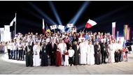 Deputy Prime Minister and Minister of State for Defense Affairs H E Dr. Khalid bin Mohammed Al Attiyah (fifth left) and other dignitaries and participants during the event.