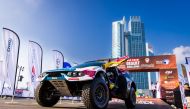 Nasser Saleh Al Attiyah drives his Prodrive Hunter during the ceremonial start of the Abu Dhabi Desert Challenge, yesterday. 