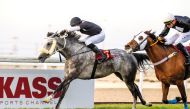 Jockey Jefferson Smith and Medan (left) on their way to win the Al Bayt Cup. PIC: Juhaim/QREC