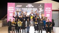 QRC Director Sheikh Jabor bin Khalid Al Thani with the podium winners during the third and penultimate round of the Sealine Qatar Sand Drag Competition.