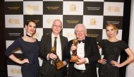 Qatar Airways officials with the awards at the World MICE Awards in Berlin.