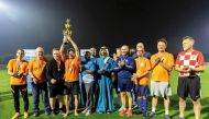 Ambassador of Finland to Qatar, H E Pekka Voutilainen, holds the trophy as Team Europe won the Ambassadors Tournament.