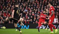 Liverpool's Egyptian striker #11 Mohamed Salah scores the team's third goal during the UEFA Europa League round of 16 second leg football match between Liverpool and AC Sparta Praha at Anfield in Liverpool, north west England on March 14, 2024. (Photo by Oli Scarff / AFP)