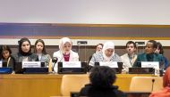 Minister of Social Development and Family H E Maryam bint Ali bin Nasser Al Misnad (front left) and other delegates at the event.
