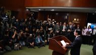 Chief Executive John Lee speaks to the media in the Legislative Council building after the passing of the Article 23 National Security Law in Hong Kong on March 19, 2024. Photo Credit: Peter PARKS / AFP.
