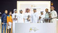 Qatar Racing and Equestrian Club’s Racing Manager Abdulla Rashid Al Kubaisi (third right) presented the trophies to the winners of the Al Jassasiya Cup. Pictures: Juhaim/QREC
