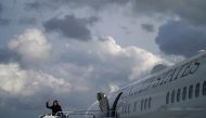 US Vice President Kamala Harris waves as she boards Air Force Two at Fort Lauderdale-Hollywood International Airport in Fort Lauderdale, Florida, on March 23, 2024. (Photo by Drew ANGERER / AFP)
