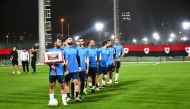 Players attend the opening ceremony of the 26th Al Rayyan Ramadan Football Championship.