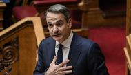 Greek Prime Minister Kyriakos Mitsotakis addresses lawmakers at parliament, ahead of a vote on confidence following a motion of censure submitted by leftist and centre-left opposition parties, in Athens on March 28, 2024. (Photo by Aris Messinis / AFP)