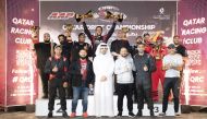 QRC Director Sheikh Jabor bin Khalid Al Thani with the podium winners of the fourth round. 
