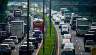 Motorists drive on the freeway leading into and out of downtown Jakarta on April 4, 2024. (Photo by Bay Ismoyo / AFP)