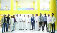 GWC officials pose with employees as part of its CSR program during Ramadan.